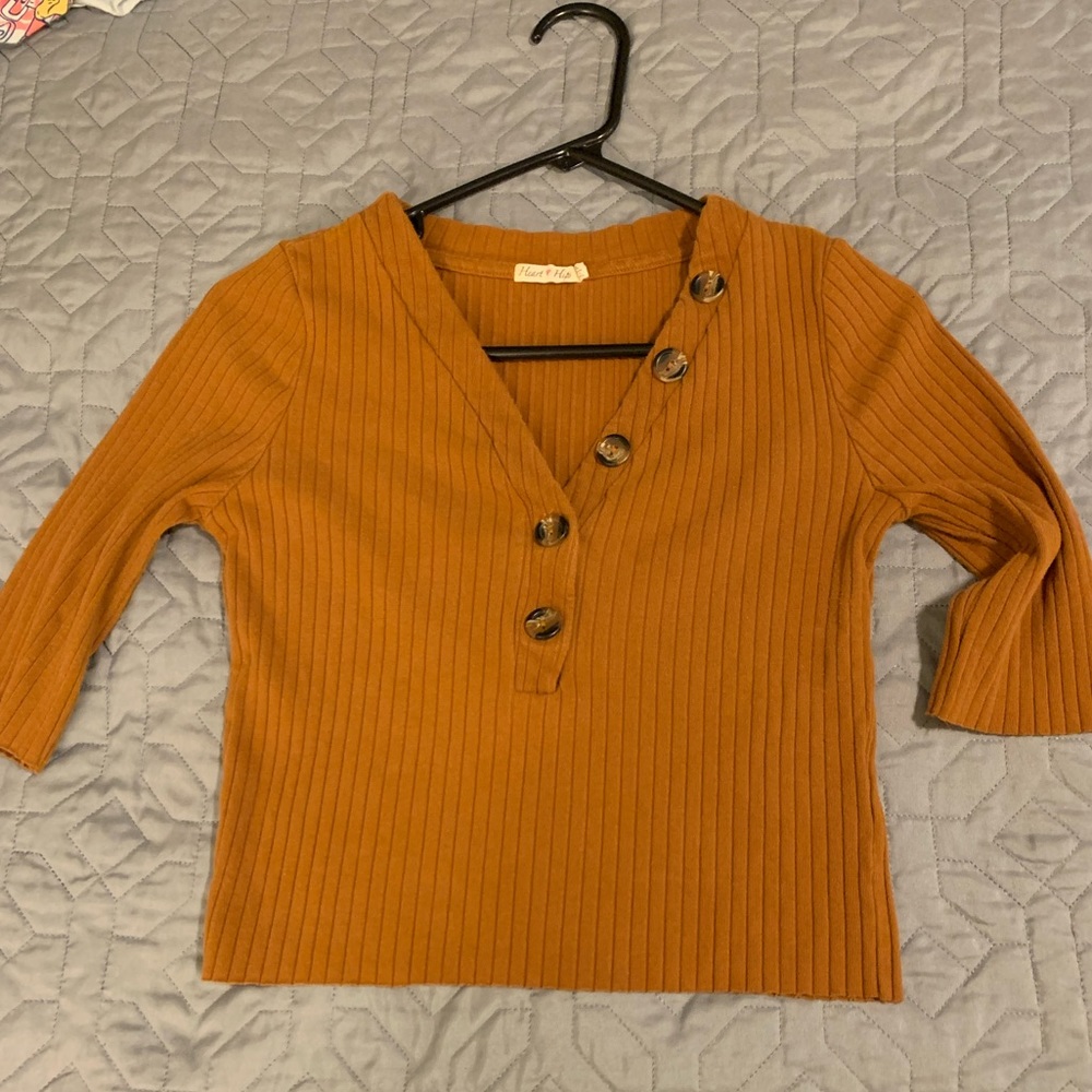 Tan crop